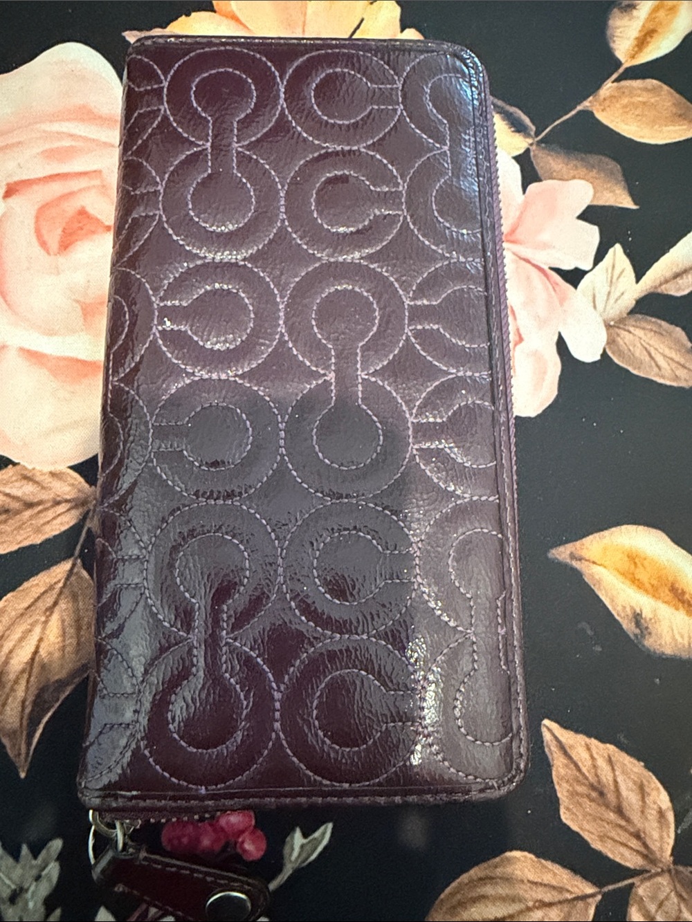 Coach Embossed Circle Pattern Zip Wallet - Deep Plum